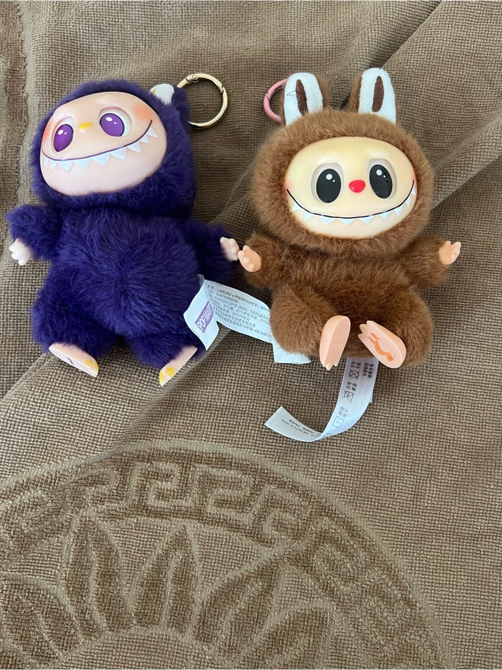 Labubus the monsters that is brown and purple.